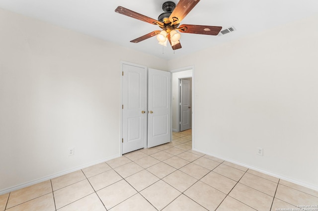8907 Silver Bow, San Antonio, TX 78242 - spare room with a ceiling fan, baseboards, and light tile patterned floors