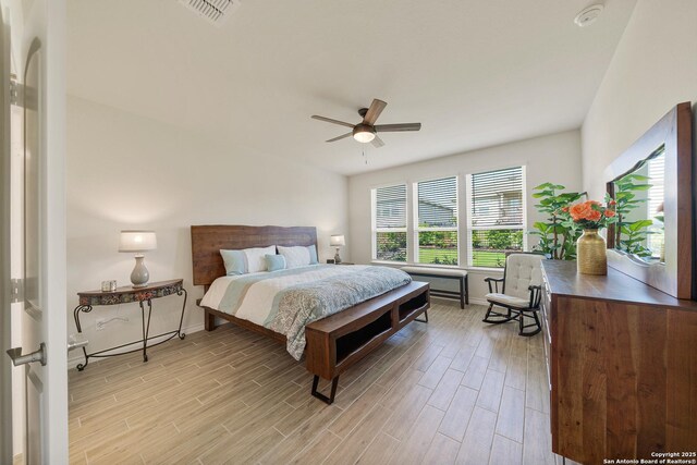 4610 Honeydew Rdg, San Antonio, TX 78253 - bedroom featuring light wood finished floors, baseboards, and ceiling fan