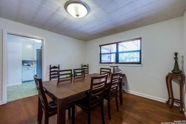 119 Janis Rae, San Antonio, TX 78201 - dining room featuring dark wood finished floors and baseboards