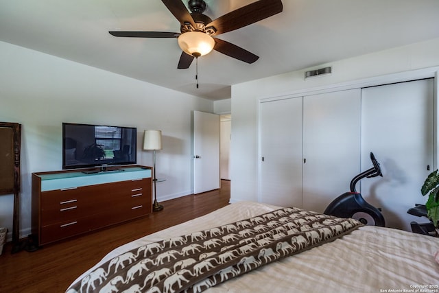 119 Janis Rae, San Antonio, TX 78201 - bedroom featuring dark wood-style flooring, a closet, baseboards, and ceiling fan