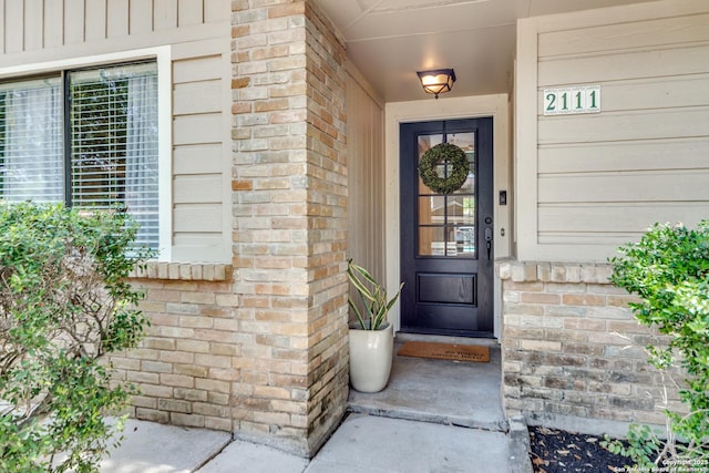 2111 Peach Blossom St, San Antonio, TX 78247 - view of exterior entry featuring brick siding