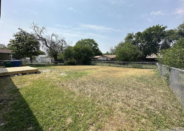 459 Maddux, San Antonio, TX 78227 - view of yard with a wooden deck