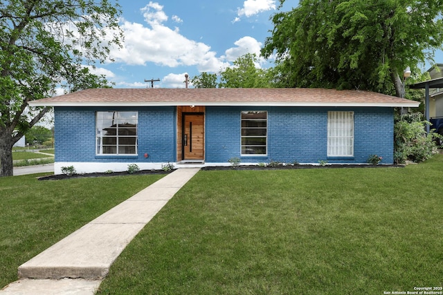 4207 Tallulah, San Antonio, TX 78218 - view of front of home with brick siding and a front lawn