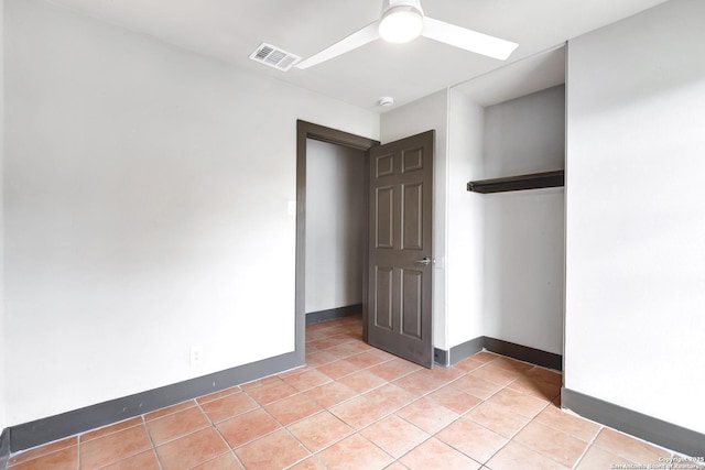 4207 Tallulah, San Antonio, TX 78218 - unfurnished room with a ceiling fan, baseboards, light tile patterned floors, and a smoke detector