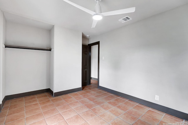 4207 Tallulah, San Antonio, TX 78218 - unfurnished bedroom with ceiling fan, baseboards, and light tile patterned floors