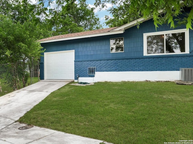 4207 Tallulah, San Antonio, TX 78218 - view of side of home with brick siding, driveway, a lawn, and central AC unit