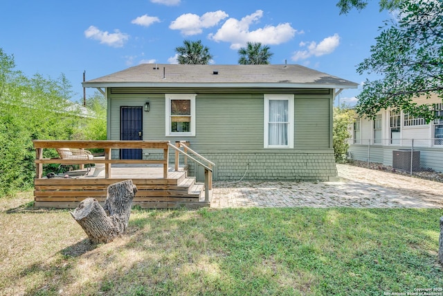 419 Wickes, San Antonio, TX 78210 - rear view of property featuring a deck, a patio, and central air condition unit
