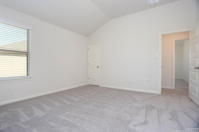 9569 Witten Dr, San Antonio, TX 78254 - spare room with vaulted ceiling, carpet floors, and baseboards