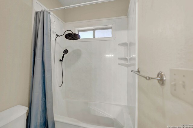 1314 Acorn, Hondo, TX 78861 - full bath with toilet and shower / bath combo with shower curtain