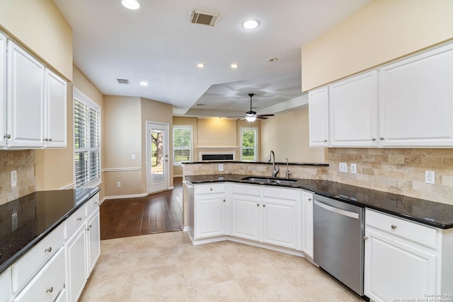 2426 Enfield Grove, San Antonio, TX 78231 - kitchen with a sink, stainless steel dishwasher, ceiling fan, white cabinetry, and recessed lighting