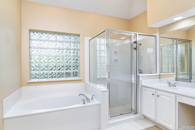 2426 Enfield Grove, San Antonio, TX 78231 - bathroom featuring a stall shower, a garden tub, and vanity