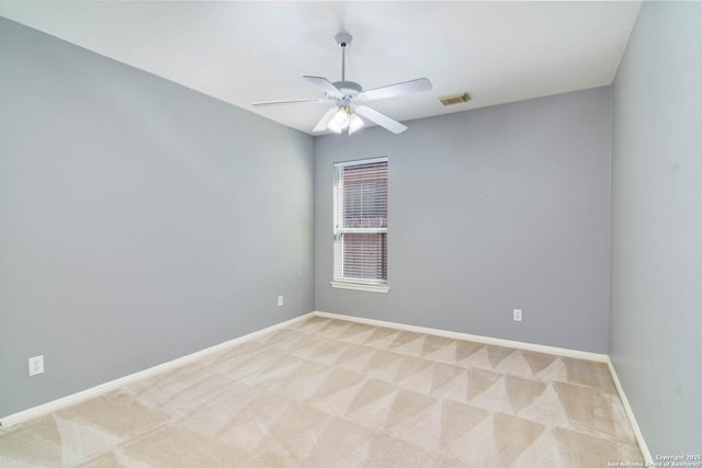 2426 Enfield Grove, San Antonio, TX 78231 - empty room with light colored carpet, ceiling fan, and baseboards