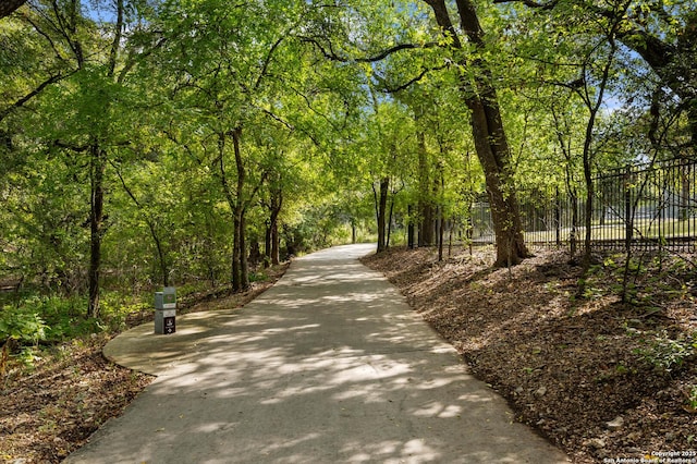 2426 Enfield Grove, San Antonio, TX 78231 - view of home's community with fence and a view of trees