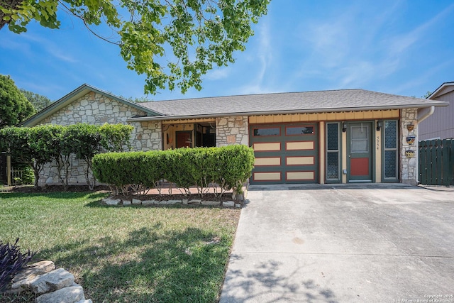 5954 Oak Run, San Antonio, TX 78247 - single story home with stone siding, an attached garage, concrete driveway, and roof with shingles