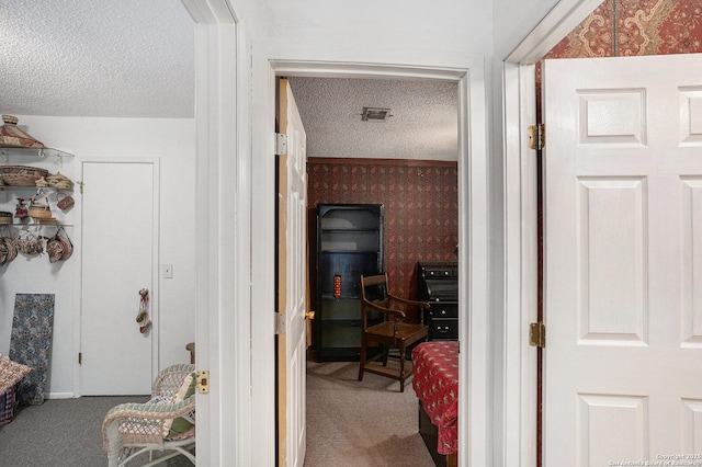 5954 Oak Run, San Antonio, TX 78247 - hall featuring a textured ceiling, carpet floors, and wallpapered walls