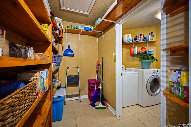 103 River Mdw, Castroville, TX 78009 - washroom with tile patterned flooring, washer and dryer, and baseboards