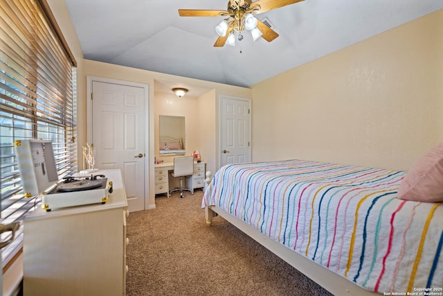 103 River Mdw, Castroville, TX 78009 - bedroom with light colored carpet, vaulted ceiling, a desk, and a ceiling fan