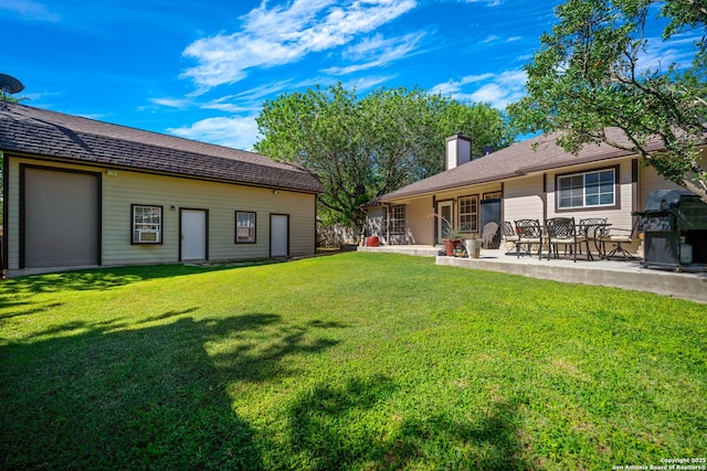 103 River Mdw, Castroville, TX 78009 - view of green lawn with a patio