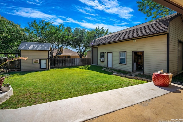 103 River Mdw, Castroville, TX 78009 - view of yard featuring an outbuilding, cooling unit, and a storage shed