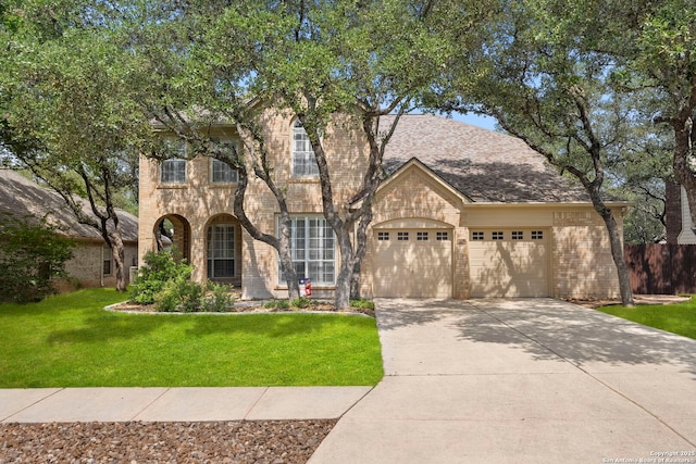 18852 Agin Ct, San Antonio, TX 78258 - view of front of property with brick siding, a garage, and driveway