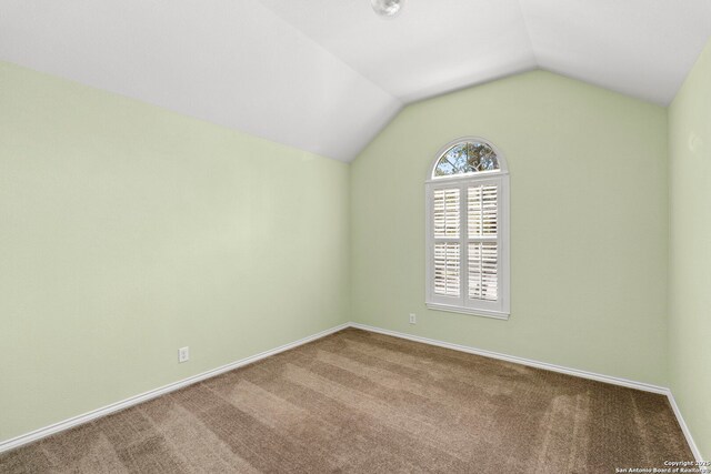 18852 Agin Ct, San Antonio, TX 78258 - additional living space with carpet, lofted ceiling, and baseboards