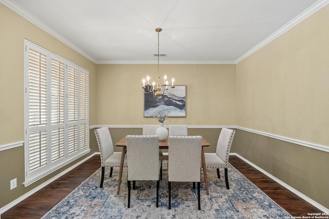 18852 Agin Ct, San Antonio, TX 78258 - dining area featuring wood finished floors, a chandelier, ornamental molding, and baseboards
