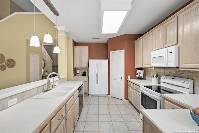 18852 Agin Ct, San Antonio, TX 78258 - kitchen featuring white appliances, a sink, decorative backsplash, light brown cabinetry, and light countertops