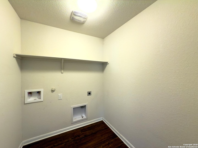 2494 Mccrae, New Braunfels, TX 78130 - washroom featuring hookup for an electric dryer, baseboards, washer hookup, gas dryer hookup, and dark wood-style floors