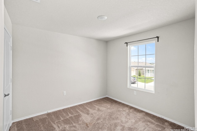 11947 Sand Wedge, San Antonio, TX 78221 - carpeted empty room with plenty of natural light and baseboards