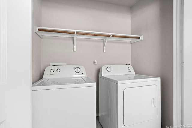 11947 Sand Wedge, San Antonio, TX 78221 - laundry area with washer and clothes dryer