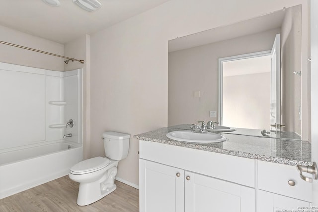11947 Sand Wedge, San Antonio, TX 78221 - full bathroom with toilet, vanity, wood finished floors, and bathtub / shower combination