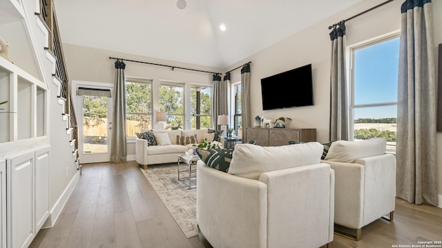 4207 Colina Crst, San Antonio, TX 78261 - living area featuring healthy amount of natural light, light wood finished floors, recessed lighting, and high vaulted ceiling
