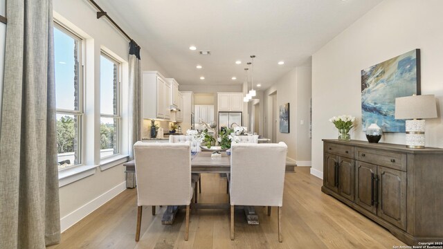 4207 Colina Crst, San Antonio, TX 78261 - dining space featuring light wood finished floors, recessed lighting, and baseboards