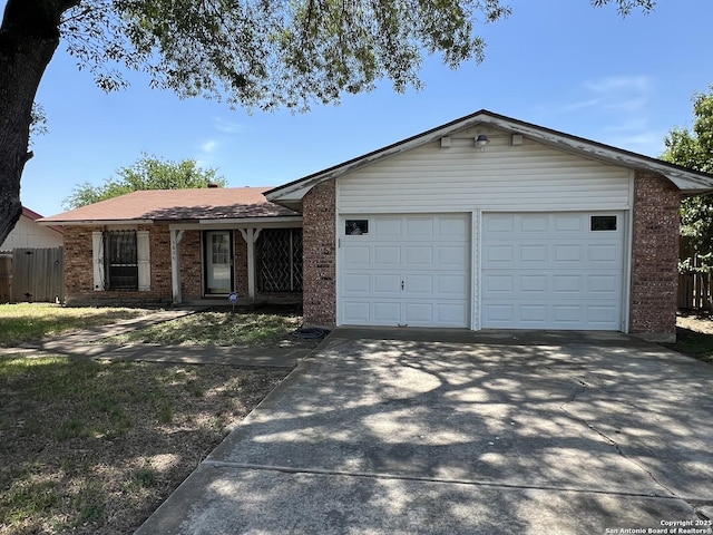 5806 Tree Vw, San Antonio, TX 78220 - ranch-style house with brick siding, driveway, a garage, and fence