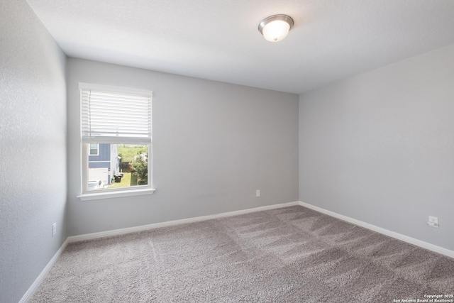 11510 Bakersfield Pass, San Antonio, TX 78245 - empty room with carpet and baseboards