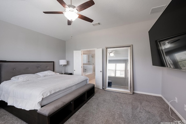 11510 Bakersfield Pass, San Antonio, TX 78245 - bedroom with carpet flooring, vaulted ceiling, baseboards, a ceiling fan, and connected bathroom
