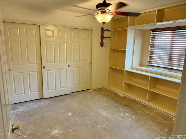 2411 Kelso, San Antonio, TX 78248 - unfurnished bedroom with a closet, concrete flooring, and a ceiling fan