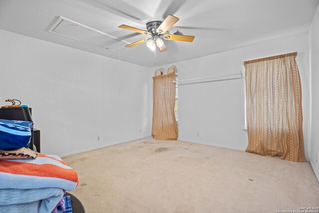 1130 Stone Gdn, New Braunfels, TX 78130 - unfurnished bedroom featuring attic access, carpet, and ceiling fan