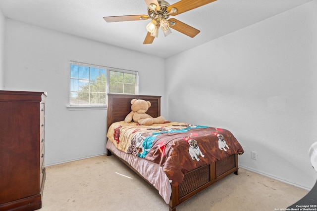 1130 Stone Gdn, New Braunfels, TX 78130 - carpeted bedroom with ceiling fan and baseboards