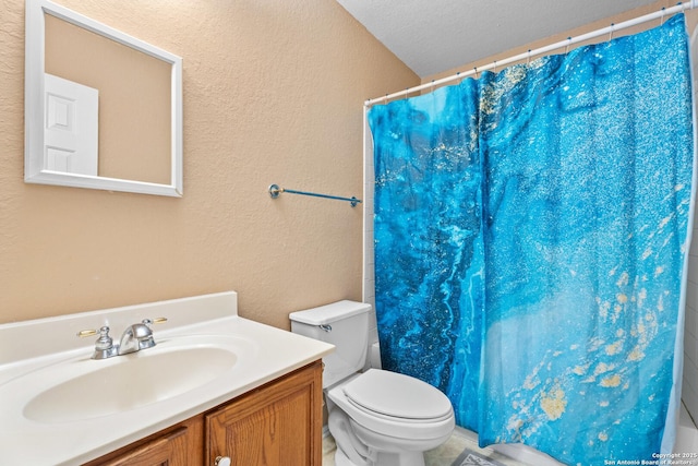 1130 Stone Gdn, New Braunfels, TX 78130 - full bathroom with a textured wall, toilet, vanity, a shower with curtain, and a textured ceiling
