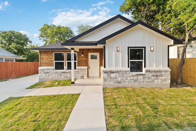 519 W Mitchell, San Antonio, TX 78204 - view of front of house with stone siding and board and batten siding