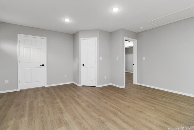 519 W Mitchell, San Antonio, TX 78204 - empty room with baseboards, light wood-style floors, attic access, and recessed lighting