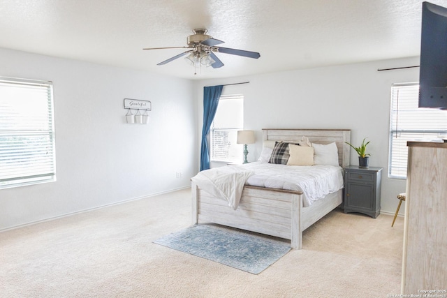 5311 Moreville Farm, San Antonio, TX 78228 - bedroom featuring light colored carpet, a ceiling fan, and baseboards