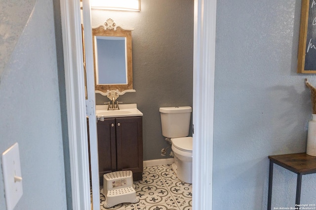 5311 Moreville Farm, San Antonio, TX 78228 - half bathroom featuring toilet, tile patterned floors, and vanity