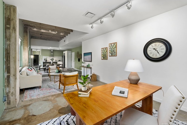 1115 S Alamo St Unit 2211, San Antonio, TX 78210 - office area featuring rail lighting, baseboards, and concrete floors
