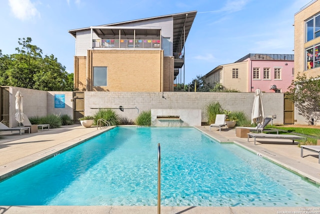 1115 S Alamo St Unit 2211, San Antonio, TX 78210 - view of swimming pool with a fenced backyard and a patio