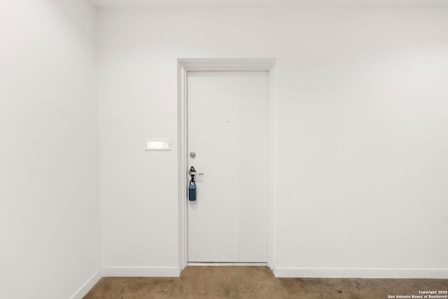 1115 S Alamo St Unit 2211, San Antonio, TX 78210 - empty room featuring baseboards and concrete floors