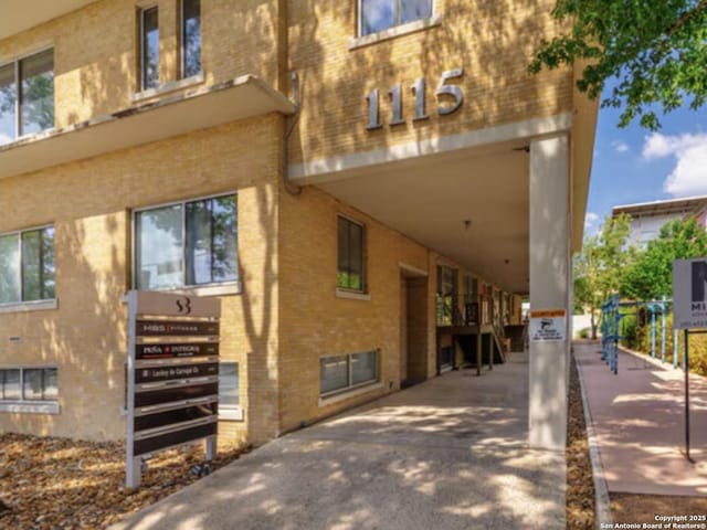 1115 S Alamo St Unit 2211, San Antonio, TX 78210 - view of property with a carport