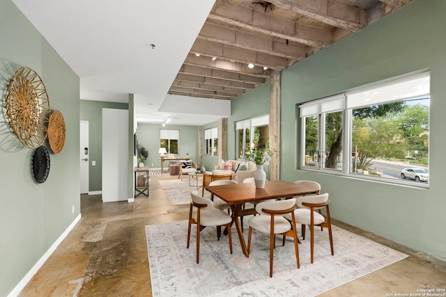 1115 S Alamo St Unit 2211, San Antonio, TX 78210 - dining room featuring concrete flooring and baseboards