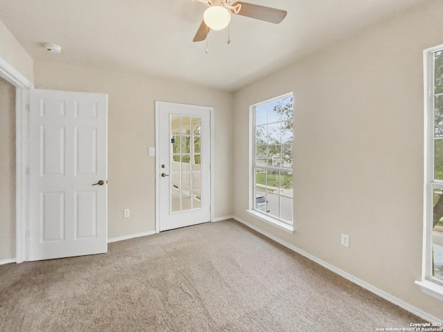 121 Lark Hl, Floresville, TX 78114 - unfurnished room featuring a smoke detector, carpet, baseboards, and ceiling fan